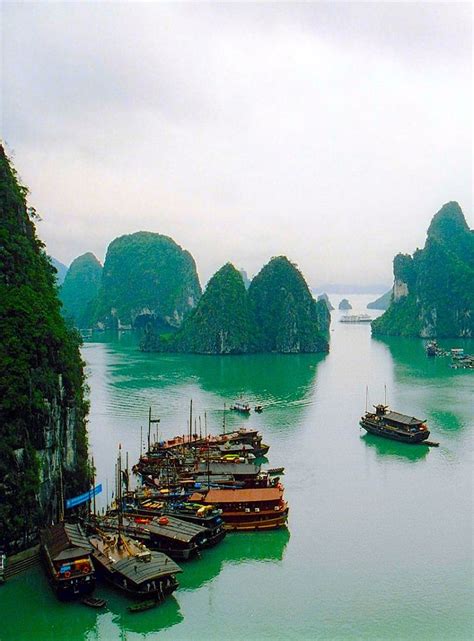 Hạ Long Bay In Northeast Vietnam Is Known For Its Emerald Waters And Thousands Of Towering