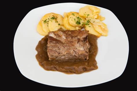 Impossibly tender beef pot roast with carrots, mushrooms and onions. Roast with Potatoes stock photo. Image of beef, carrots ...