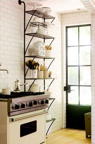 Practical wall mounted kitchen shelves featuring a sturdy stainless steel construction. Trends: Metal Shelves in Kitchens | The Estate of Things