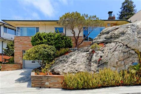 These buildings are like going back in time. Like a Rock: The Hellbaum House in Berkeley is built into ...