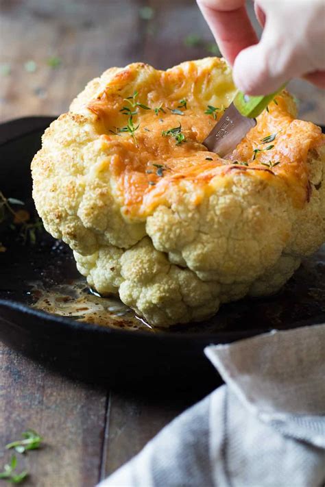 Carefully lift the cauliflower out of the pot with a large slotted spoon and place it onto the prepared baking dish. Whole Roasted Cauliflower - Green Healthy Cooking