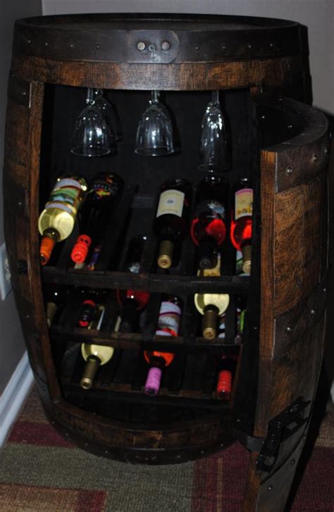 In this video i build a whiskey and wine rack from an old coffee table. whiskey barrel wine rack cabinet. by BarrelWorx on Etsy