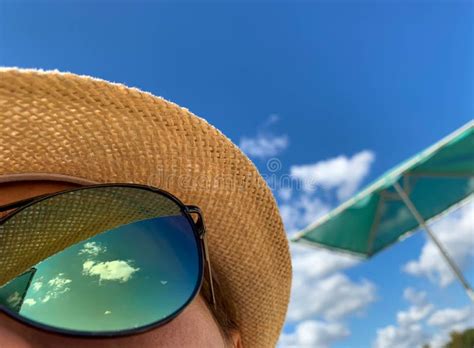 Summer Sky Reflection In Woman Sunglasses At Sunny Day Stock Photo
