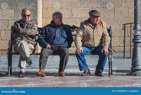 Three Senior Men Are Sitting On A Bench Editorial Stock Image Image