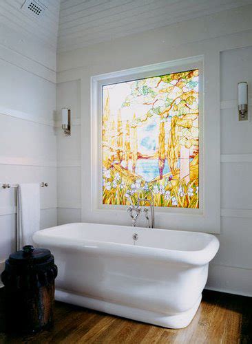 Hard water stains appear as white, hazy spots on glass surfaces. To da loos: Stained glass windows in the bathroom