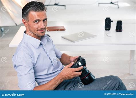 Smiling Handsome Photographer Using Camera Stock Image Image Of Lens