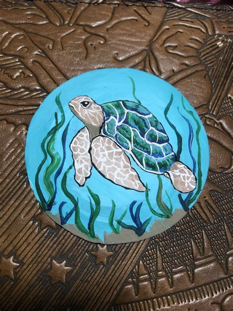 Painted on shell | Turtle painted rocks, Painted sand ...