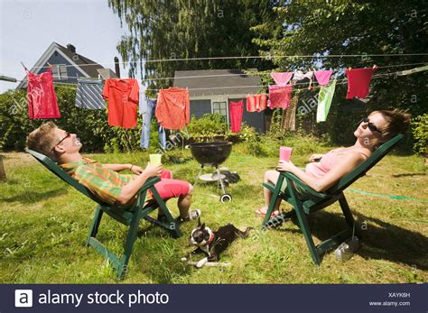 sunbathing in backyard stowaway s body falls from plane lands next to london man sunbathing in