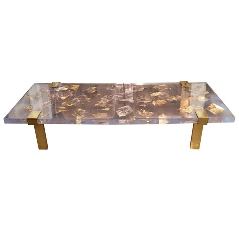 76.67% steel and 23.33% tempered glass • set includes: Contemporary Gold Leaf Inlay Coffee Table with Brass Frame ...