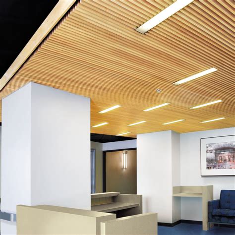 Create an uncluttered and monolithic ceiling using our large size soft fibre panels along with soft fibre planks. Wood Ceilings, Planks, Panels | Armstrong Ceiling ...