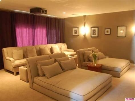 Fresh popcorn antiqued wood sign. Love the home theater Inside Charlize Theron's $3.8 ...