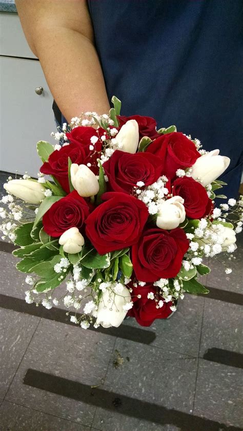 Our mixed bouquets come in many colors, and floral varieties like roses, tulips, lilies & more for the perfect bouquet. Red Roses, White Tulips, Babies Breath and Pitosporum ...