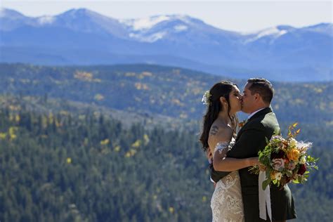 The Bride And Groom Share Their First Kiss At Granby Ranch Justin