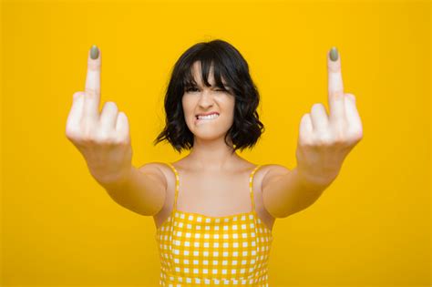 Tumblr is a place to express yourself, discover yourself, and bond over the stuff you love. Young Woman Showing Middle Finger Stock Photo - Download ...