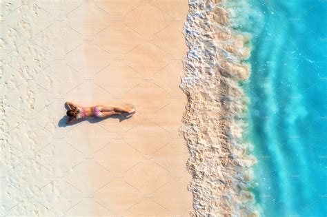 Aerial View Of Woman On The Beach Featuring Girl Woman And Water