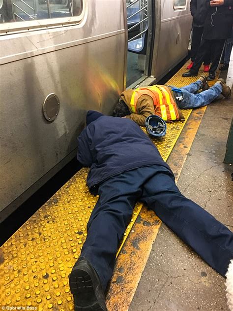 horrifying photos of woman trapped under nyc subway train
