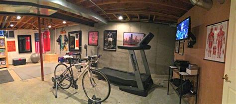 It is bright with pops of colour including a painted ceiling and carpet tiles on the floor. 20 Amazing Unfinished Basement Ideas You Should Try | Gym ...