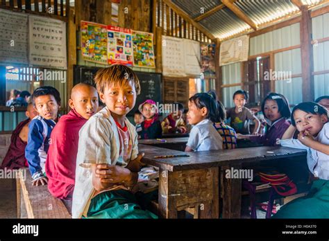 School Children Sitting At Their Desks Classroom Shan State Myanmar