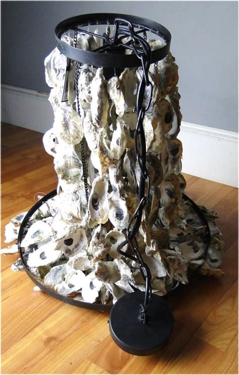 The tropical paradise 632ym rectangular chandeliers combine rectangular cut oyster shell and dazzling crystal strands. Oyster Shell Chandelier Light Fixture Hand Made Iron Beach ...