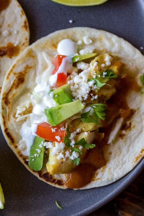 Our recipe calls for broiling the fish so that the dish comes together quickly and easily all year round and mimics the grilled fish tacos enjoyed at beachside shacks. Marinated Fish Tacos | Easy fresh fish taco recipe