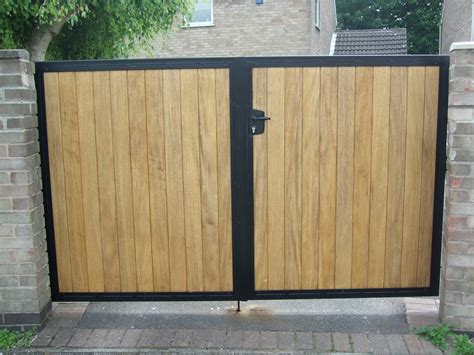Decorative metal gates with wood infill. Metal and Wood Combined Gates
