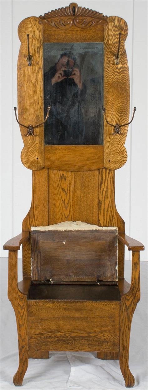 This hall tree features a natural tree theme. Oak Seated Hall Tree Stand Seat with Storage Coat Hat Rack ...