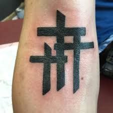 Cross tattoo designs on arm. What Does 3 Cross Tattoo Mean? | Represent Symbolism