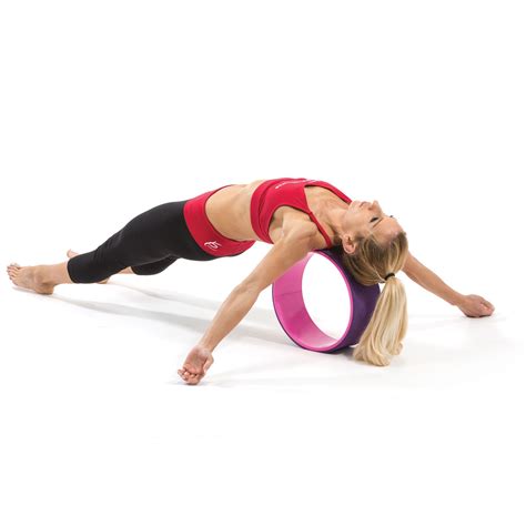 How To Use A Yoga Wheel For Stretching Yoga Wheel Exercises Yoga