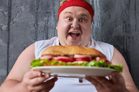 Handsome Caucasian Fat Man Going To Eat Big Tasty Sandwich Stock Photo