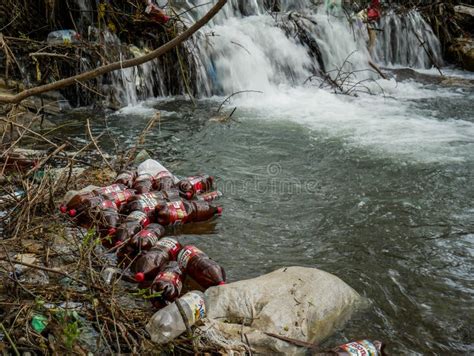 Floating Plastic Bottles Human Garbage In The Small River Editorial