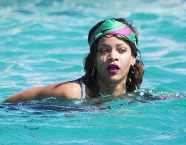 Popular Singer Rihanna Flaunts Incredible Bikini Body As She Lazes By