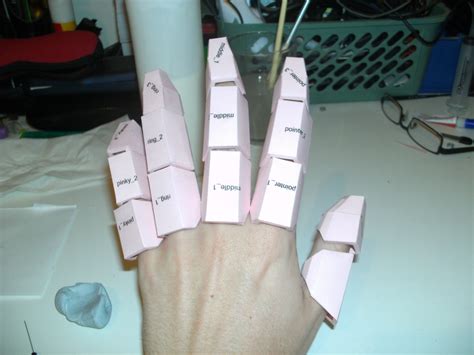 Unlike my previous gauntlets, there is minimal riveting, as most of the parts are held to the glove using epoxy. iron man hand pepakura 2 by Cyber-Hand on DeviantArt