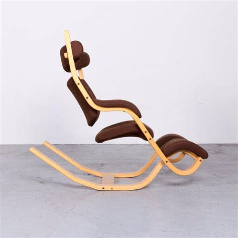 Inner balance wellness covers their massage chairs with a 5 year manufacturers warranty. Stokke Gravity Balans Designer Fabric Chair Rocking Chair Brown Pattern Look at 1stdibs
