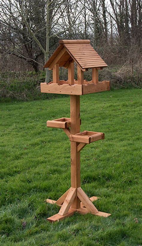 Squirrel proof bird feeder tutorial steps. Triple Platform Bird Table | Bird houses diy, Wooden bird ...