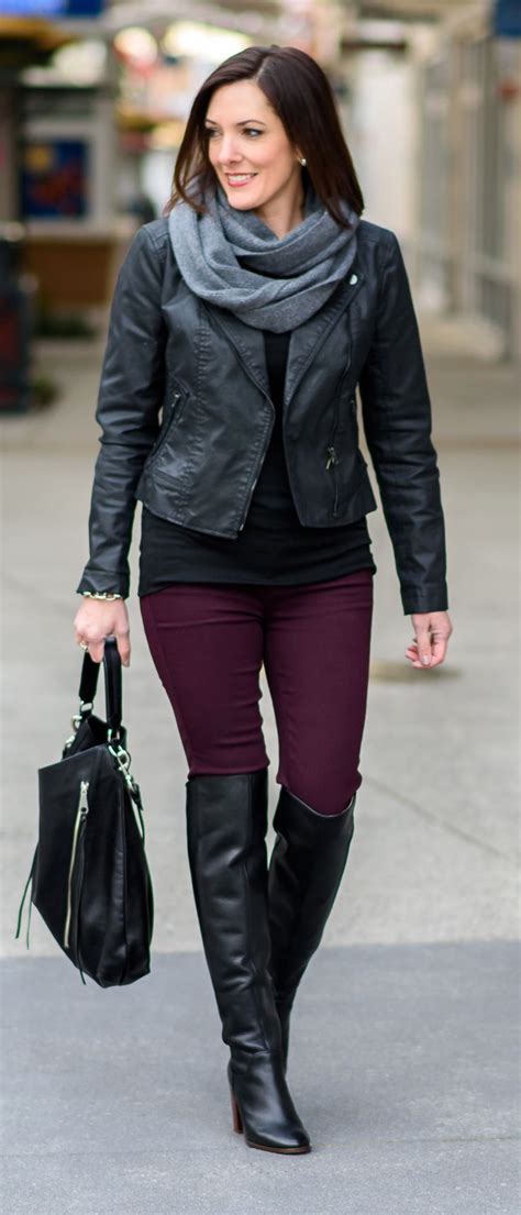 jo lynne shane wearing burgundy skinnies with over the knee boots moto jacket and infinity