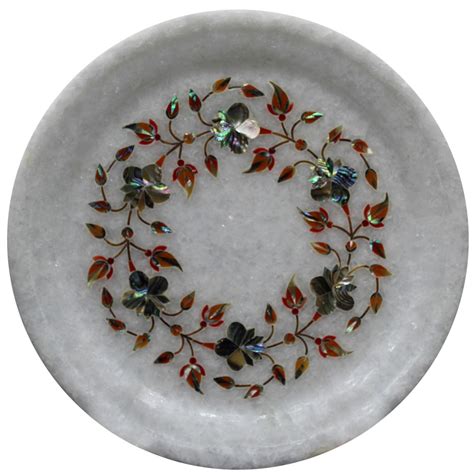 For instance, if she loves to bake or create unique recipes, it would be ideal to think of unique gift ideas for these hobbies. Decorative Round White Marble Plate For Home Decor - Artefactindia