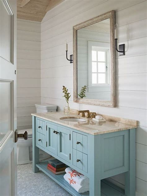 Three clear globe shades let you see the bare 60w bulbs (not included) that wash your. 15+ Amazing Coastal Bathroom Designs - Page 13 of 17