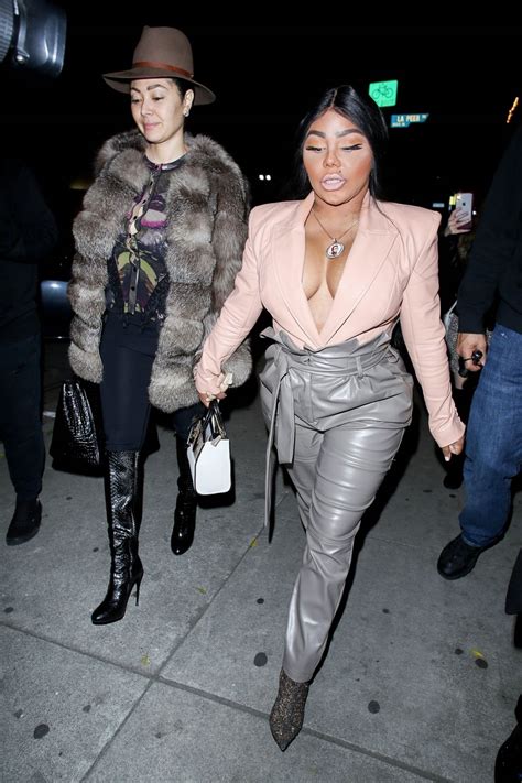 Lil Kim Shows Off Her Cleavage Outside Craigs In West Holywood