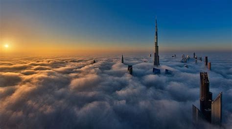 Heavenly Photographs Of Dubai Skyscrapers Poking Through A Sea Of Clouds