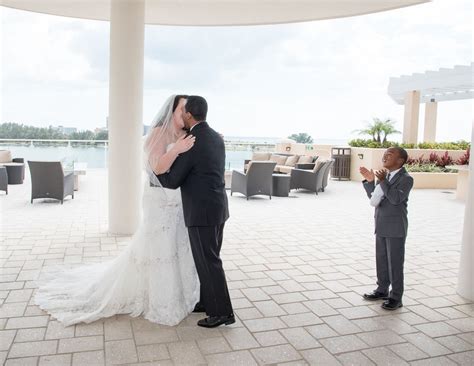 Bride And Groom First Kiss At Rooftop Wedding Hampton Inn Suites