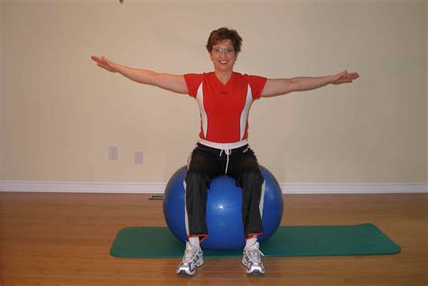 Bilateral Leg Raise On The Exercise Ball Arms Out