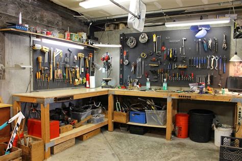 Collection by gary lickfield • last updated 2 weeks ago. l-shaped garage workbench with pegboard tool storage the ...