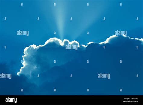 Sunrays Breaking Through Clouds Stock Photo Alamy