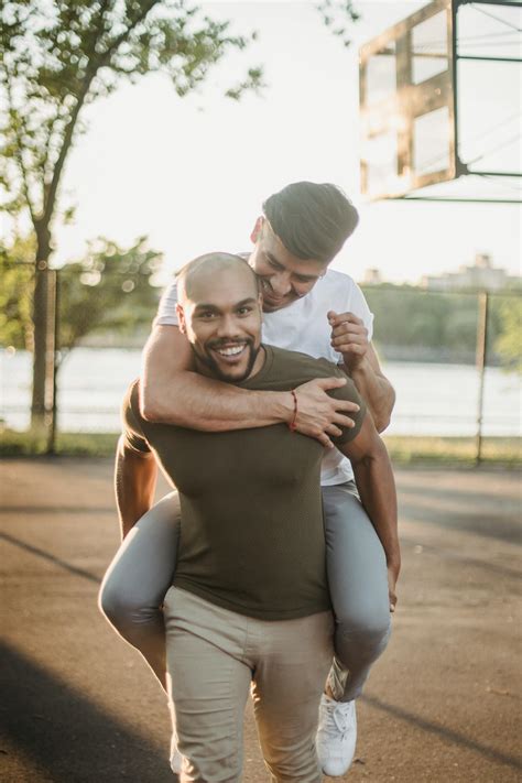Man Carrying Another Man · Free Stock Photo