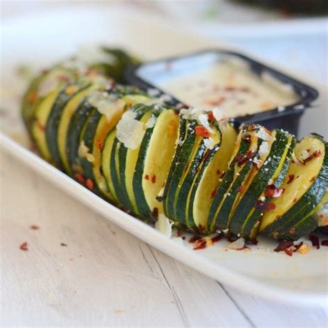 Maybe you would like to learn more about one of these? Baked Hasselback Zucchini with garlic. Serve a healthy ...