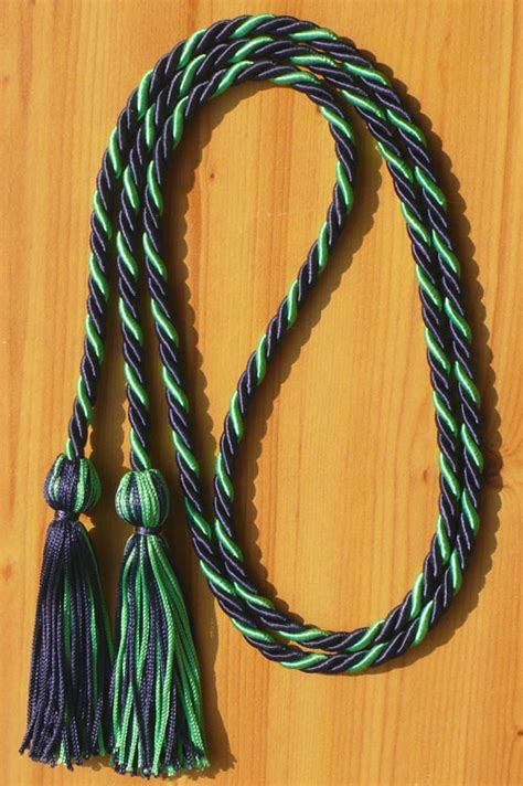 It recalls the lush landscape and gently rolling hills of ireland. Navy Blue and Kelly Green Intertwined Graduation Honor ...