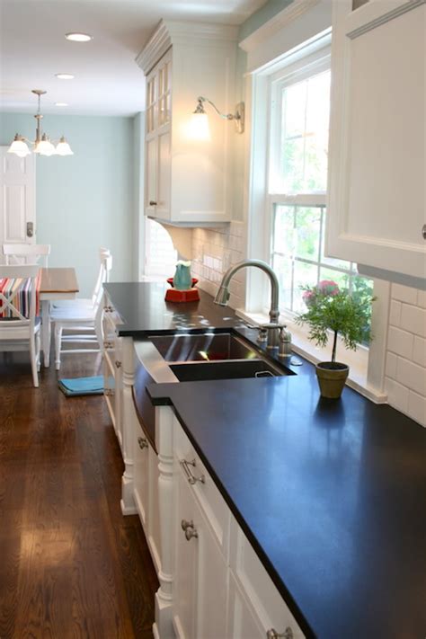 When looking for kitchen cabinet colors that match with stainless steel, it is more a question of what other colors are already in use in the kitchen's decor. kitchens - white shaker kitchen cabinets stainless steel ...