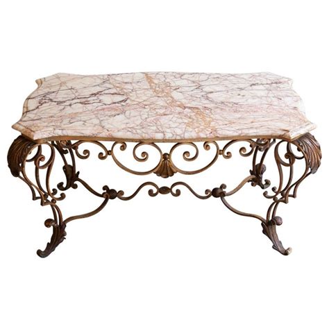 Click on a table below for details options and awesome, wish it were in my home pictures. Antique Wrought Iron and Marble Coffee Table at 1stdibs