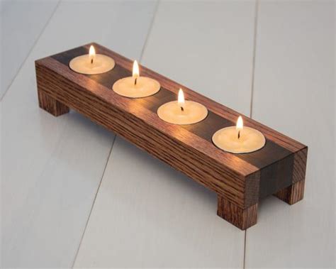 Maybe you would like to learn more about one of these? Wood candle holder. Tea light candle holder. Home by ecokazen