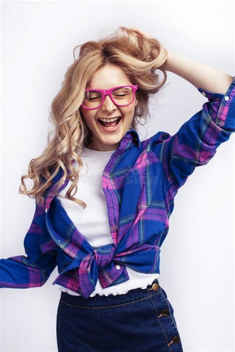 Young Pretty Blond Teenage Hipster Girl In Glasses Posing Emotional Happy Smiling Gesturing